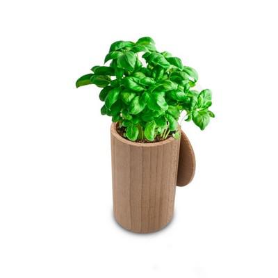Wooden flower pot, basil seeds and soil