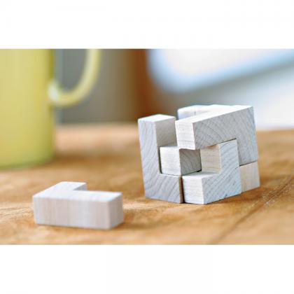 Wooden puzzle in cotton pouch