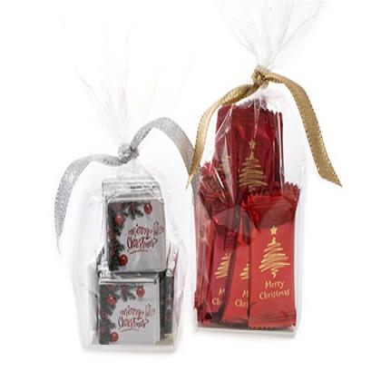 CHRISTMAS CLEAR SACHET GIFT BAGS & BOW WITH CHOCOLATES OR SWEETS