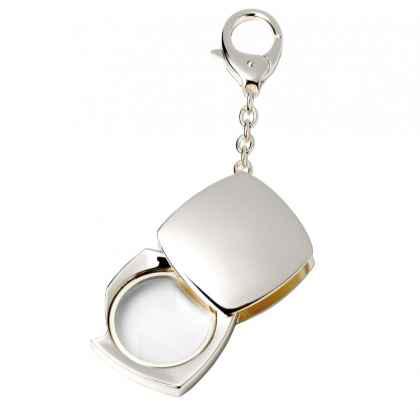 Key chain with magnifier "Evolution"